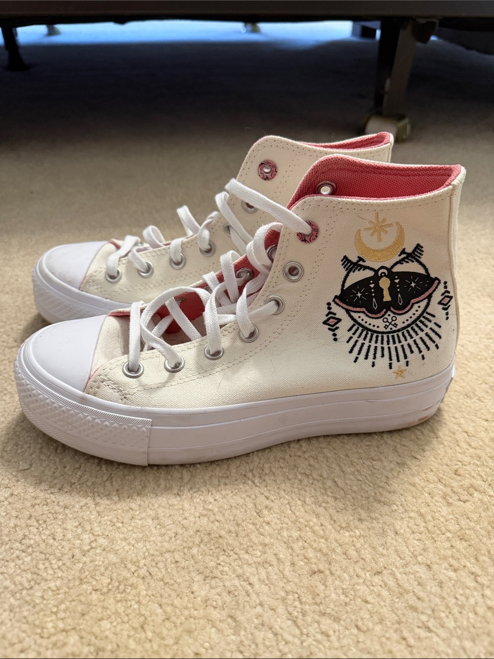 High-Top Converse Sneakers in Cream with Pink Lining